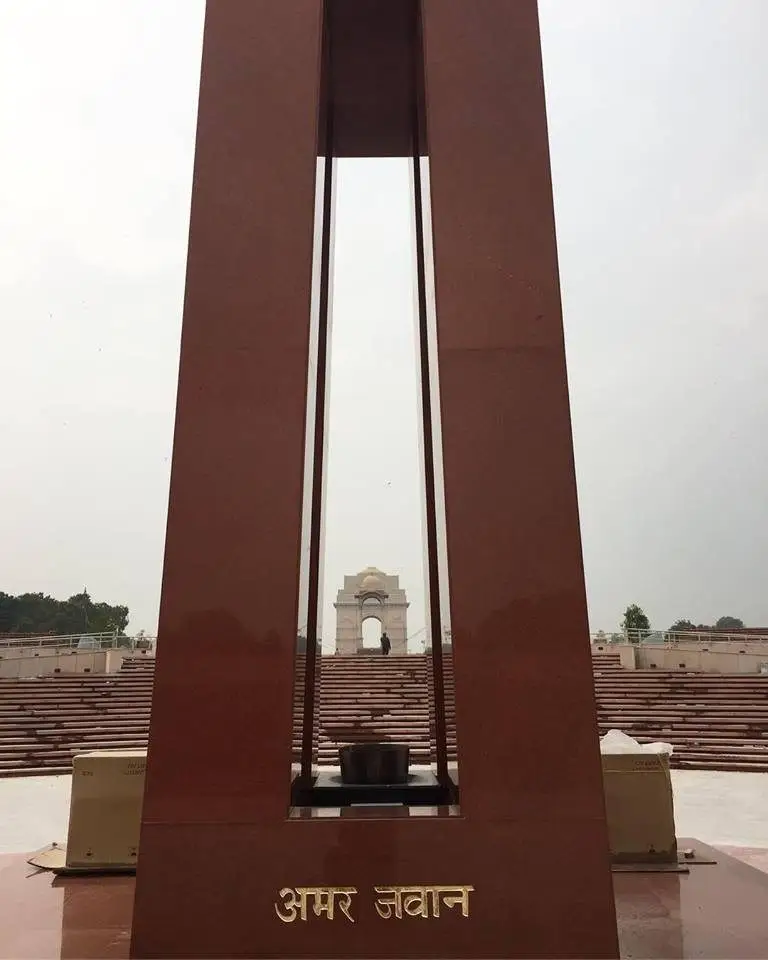 Central obelisk clad in red granite